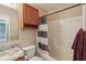 Bathroom features a granite vanity top, storage cabinet, and shower at 1246 Valdosta Pl, Westfield, IN 46074