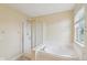 Bathroom features a tub, shower, and window at 1246 Valdosta Pl, Westfield, IN 46074