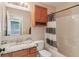 Bathroom features a granite vanity top, storage cabinet, and shower with a striped curtain at 1246 Valdosta Pl, Westfield, IN 46074