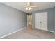Bedroom featuring neutral walls, carpet flooring, and a large closet at 1246 Valdosta Pl, Westfield, IN 46074
