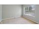 Bedroom featuring neutral walls, carpet flooring, and a large window allowing for lots of natural light at 1246 Valdosta Pl, Westfield, IN 46074