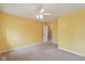 Bright yellow bedroom with carpet and ceiling fan at 1246 Valdosta Pl, Westfield, IN 46074