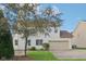 Charming home with two-car garage, tree in yard, and inviting entrance at 1246 Valdosta Pl, Westfield, IN 46074