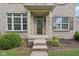 Inviting front entrance with brick columns, covered porch, and well-kept landscaping at 1246 Valdosta Pl, Westfield, IN 46074