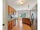 Kitchen featuring granite countertops, a tile backsplash, stainless steel appliances, and hardwood flooring at 1246 Valdosta Pl, Westfield, IN 46074