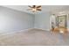 Large, open living area with neutral carpet and hardwood floors, next to foyer and stairs at 1246 Valdosta Pl, Westfield, IN 46074