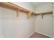 Walk-in closet with shelving and carpet flooring at 1246 Valdosta Pl, Westfield, IN 46074