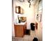 Small kitchen features a sink, cabinetry, and an adjacent window at 130 S Arlington Ave, Indianapolis, IN 46219