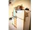 Kitchen area with appliances and cabinetry, offering essential cooking space at 130 S Arlington Ave, Indianapolis, IN 46219