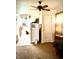 An open floor plan from the living room looking into the kitchen, featuring a ceiling fan at 130 S Arlington Ave, Indianapolis, IN 46219