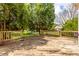 View from deck showing the green yard and the wooden fence around the property at 14030 Old Mill Ct, Carmel, IN 46032