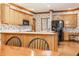 Bright eat-in kitchen with wood cabinets, countertops and stainless steel appliances at 14030 Old Mill Ct, Carmel, IN 46032
