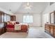 Spacious main bedroom features plush carpeting, a ceiling fan, and built-in wardrobe at 14030 Old Mill Ct, Carmel, IN 46032