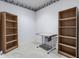 Home office or spare room with shelving units and a drafting table at 14030 Old Mill Ct, Carmel, IN 46032