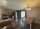 Spacious kitchen with stainless steel appliances, wood cabinets, and sliding glass doors at 1406 Bigleaf Cir, Sheridan, IN 46069