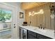 Wet bar features a beverage refrigerator, sink, and wine rack with the Gathering name displayed at 1406 Linden St, Indianapolis, IN 46203