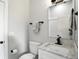 Stylish bathroom with modern fixtures and a marble vanity at 1406 Linden St, Indianapolis, IN 46203