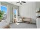 Cozy bedroom with a crib, chair, and natural light from the windows at 1406 Linden St, Indianapolis, IN 46203