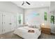 Bright bedroom featuring dual closets, windows, and clean and simple interior design at 1406 Linden St, Indianapolis, IN 46203