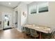 Dining area includes an exterior door to backyard access and an adjacent mud room with built-ins at 1406 Linden St, Indianapolis, IN 46203
