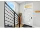 Bright foyer featuring modern staircase, stylish decor, and a welcoming atmosphere at 1406 Linden St, Indianapolis, IN 46203