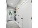 Hallway with convenient wet bar, outside access, and closet space at 1406 Linden St, Indianapolis, IN 46203