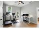 Bright office with exercise equipment, workstation, and natural light at 1406 Linden St, Indianapolis, IN 46203