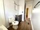 Well-maintained bathroom with a modern vanity, toilet, shower, and natural light at 1509 S Rural St, Indianapolis, IN 46203
