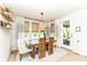 Well-lit dining room with a backyard view and access to the outdoor space at 16283 Spring Bank Ct, Fishers, IN 46040