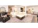 Finished basement with seating area, including leather armchair and plush sectional sofa at 16283 Spring Bank Ct, Fishers, IN 46040