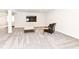 Cozy living room with plush gray carpet, flat screen tv, and comfortable leather chair at 16283 Spring Bank Ct, Fishers, IN 46040