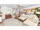 Inviting living room featuring ample seating, open floor plan, and seamless flow to the kitchen and dining areas at 16283 Spring Bank Ct, Fishers, IN 46040