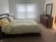 Spacious bedroom with large window, dresser and light-toned walls at 1807 Park North Bnd, Indianapolis, IN 46260