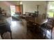 Bright living and dining area with hardwood floors and a fireplace, perfect for entertaining at 1807 Park North Bnd, Indianapolis, IN 46260
