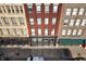Aerial view of a historic building featuring Meridian Lofts with street and sidewalk view at 207 S Meridian St # 2F, Indianapolis, IN 46225