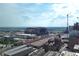 Panoramic view of the city showcasing the stadium, adjacent buildings, and distant skyline under a clear sky with clouds at 207 S Meridian St # 2F, Indianapolis, IN 46225