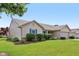 Lovely single-story home featuring blue shutters and lush landscaping, providing an inviting curb appeal at 2127 Yosemite Dr, Lebanon, IN 46052