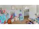 Playroom with neutral carpet, and an open doorway to the living spaces at 2127 Yosemite Dr, Lebanon, IN 46052