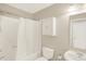 Cozy bathroom features a shower-tub combination with a white shower curtain at 248 Eastview Dr, Bargersville, IN 46106