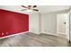 Large bedroom features wood-look flooring and a view to the hallway at 248 Eastview Dr, Bargersville, IN 46106
