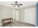 Bedroom features ceiling fan, closet, and wood-look flooring at 248 Eastview Dr, Bargersville, IN 46106