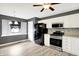Eat-in kitchen with new floors, stainless steel appliances, tile backsplash and window nook at 248 Eastview Dr, Bargersville, IN 46106