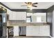 Bright kitchen features stainless appliances, sleek countertops and modern cabinets at 248 Eastview Dr, Bargersville, IN 46106