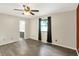 Large main bedroom has wood-look floors and bathroom access at 248 Eastview Dr, Bargersville, IN 46106