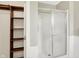 Shower with sliding glass doors and white paneling at 248 Eastview Dr, Bargersville, IN 46106