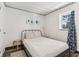 Cozy bedroom with a comfortable bed and a scenic window view at 26735 Six Points Rd, Sheridan, IN 46069