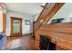 Foyer showcases a wooden staircase, vintage writing desk, and hardwood floors with a door to outside at 26735 Six Points Rd, Sheridan, IN 46069