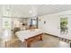 Bright kitchen boasts an island with bar seating and adjacent dining area at 26735 Six Points Rd, Sheridan, IN 46069