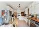 Bright kitchen with white cabinetry, stainless appliances, and butcher block countertops at 26735 Six Points Rd, Sheridan, IN 46069