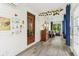 Bright, inviting sunroom with wood floors, comfortable seating, and ample natural light at 26735 Six Points Rd, Sheridan, IN 46069